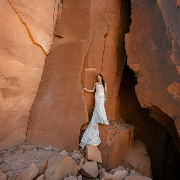 Woman Climbing in utah in a wedding dress